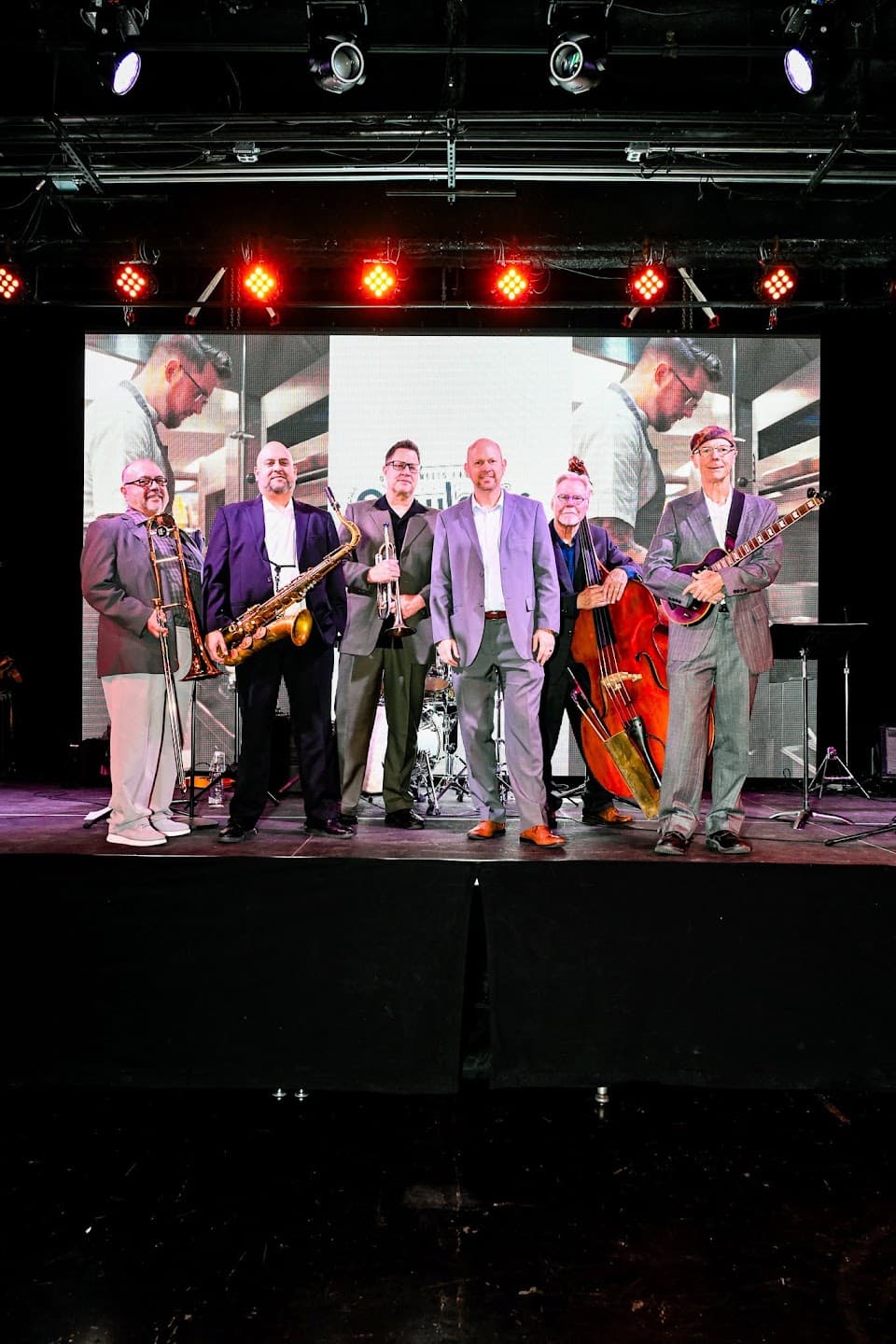 A live band performing at Beaujolais & Beyond in Denver